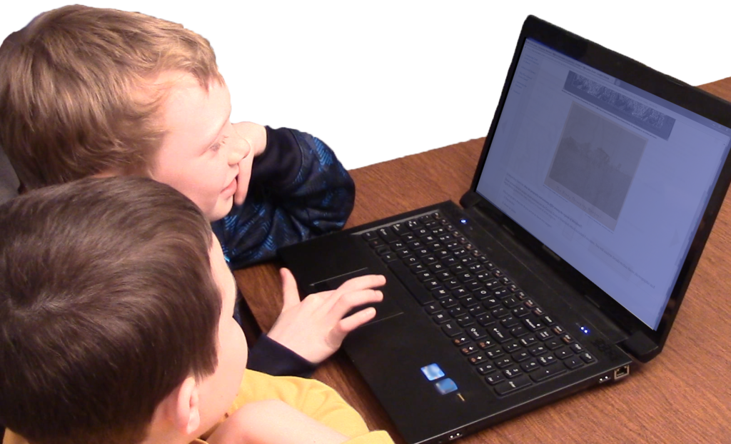 Two students explore an online lesson